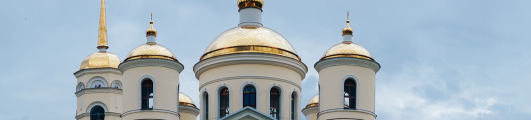 panorama of the church in the blue sky with white clouds