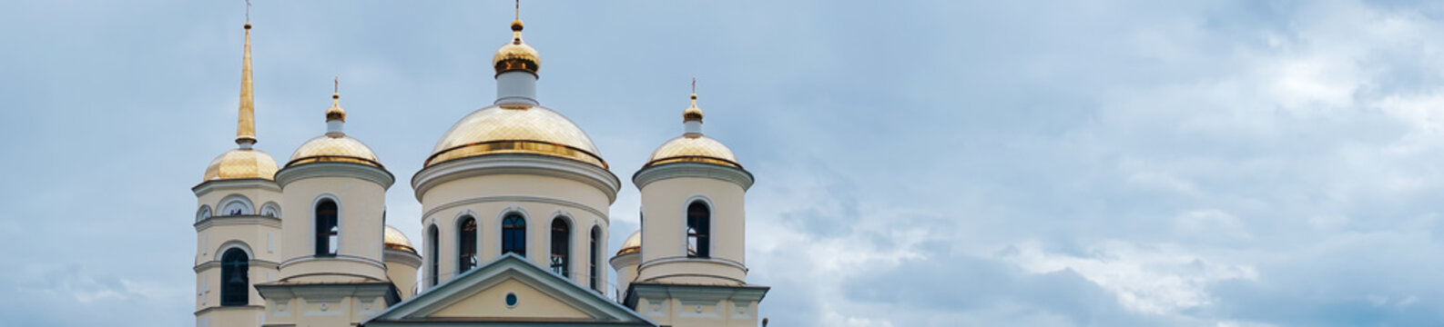 panorama of the church in the blue sky with white clouds