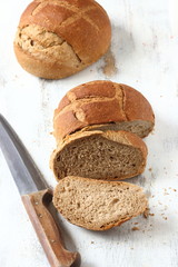 Bread, whole grain wheat bread on a white background