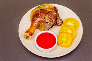 Crusty roasted duck leg. Traditional French food confit preparation