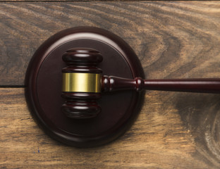 Top view wooden judge gavel on a stand