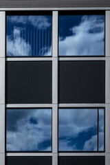 Sky reflected in modern windows