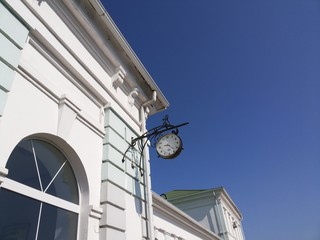 vintage clocks at train station hanging