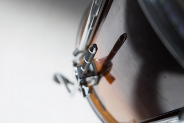 percusions drums with drumsticks on it close-up