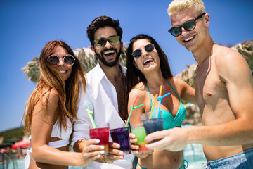 Group of friends having fun on summer vacation. Lifestyle, friendship, travel and holidays concept