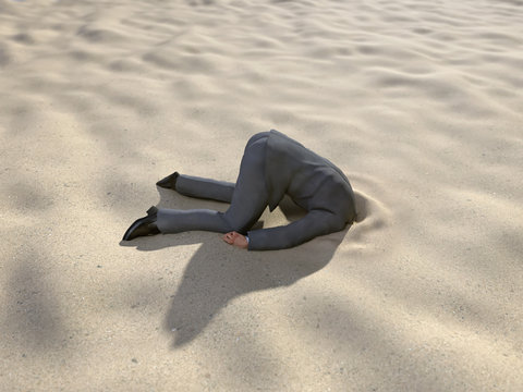 businessman hiding his head in the sand