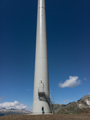 Panoramic view from the Cornopass, large wind mills, Switzerland.