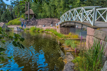 View of bridge in summer park