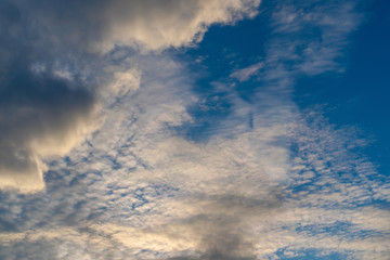 Blue sky with clouds on a bright sunny day. The vast blue sky and clouds sky. clouds in the sky.