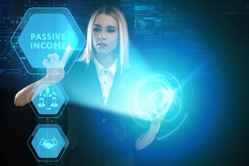 The concept of business, technology, the Internet and the network. A young entrepreneur working on a virtual screen of the future and sees the inscription: Passive income