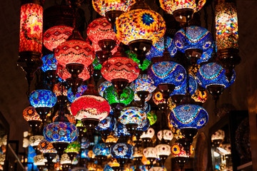many many color chandeliers in the store