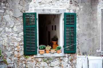 open window in an old stone house