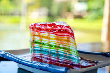 Colorful bright crepe cake rainbow layer.