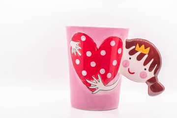 cup of tea with hearts on white background