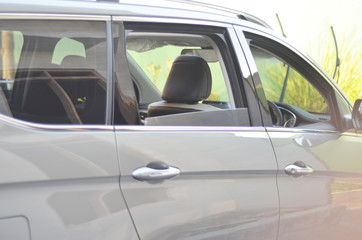 Car passenger window open from side view
