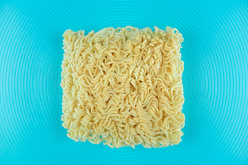 Noodle in big Glass bowl Underwater with blue backgroung