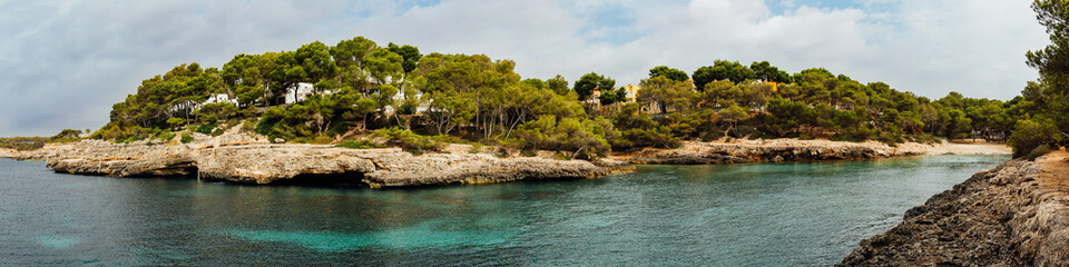 Obraz premium Cala Barca Trencada panoramic