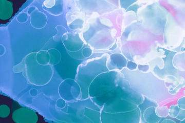 Colorful hand painted alcohol ink background. Abstract delicate texture. Contemporary wallpaper.