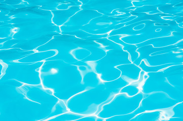 Wonderful blue and bright ripple water and surface in swimming pool