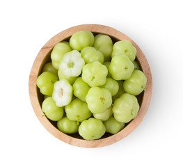 star gooseberry in wood bowl isolated on white background. top view