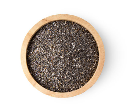 Chia seeds in wooden bowl isolated on white background. top view