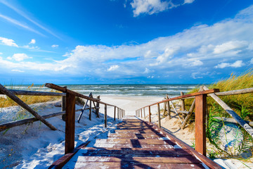 Entrance to sandy Bialogora beach on coast of Baltic Sea, Poland - obrazy, fototapety, plakaty