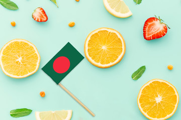 Bangladesh Paper Stick Flag. National summer fruits concept, local food market. Vegetarian theme.