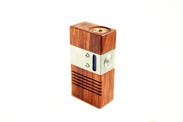 Vaping mod in wooden box isolated in white background