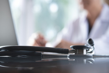 Doctor working on laptop computer