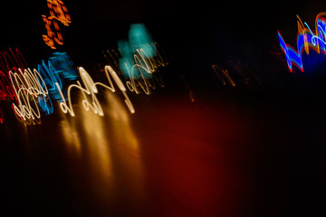 Naklejka na ściany i meble Abstract bright blurred neon trend background, multi-colored lines. Speed light beam night traffic and lights.