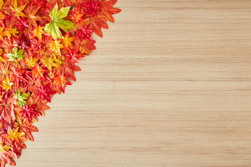 Autumn leaves on a wooden table