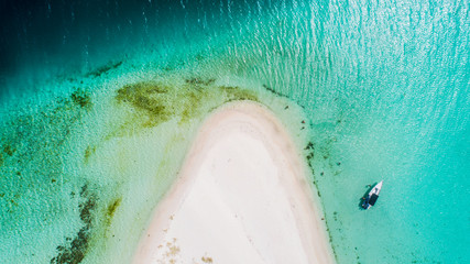 Caribbean: Vacation in the blue sea and deserted islands. Aerial view of a blue sea with crystal water. Great landscape. Beach scene. Aerial View Island Landscape Los Roques