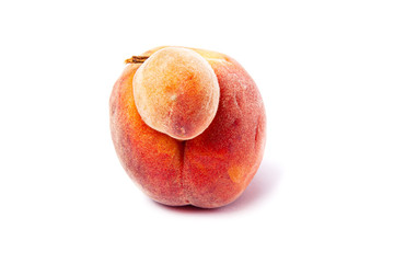 Trendy ugly food. Peach fruit isolated on white background. Misshapen produce, food waste problem concept