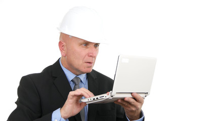 Image with Busy Engineer Using Laptop Communication