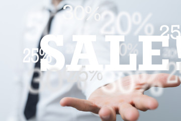 sale digital percent in hand