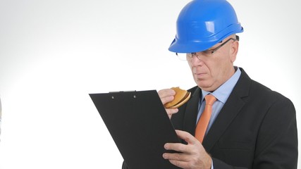 Hungry Engineer Read From Agenda and Eat a Tasty Sandwich