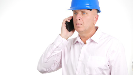 Image with Confident Engineer Talking to Smartphone