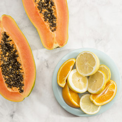 Close-up papaya and citrus fruit