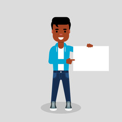 Young African American in jeans and sweatshirt is holding a blank sheet and pointing to it. Boy holding empty sign with place for text. Advertising, promotion, concept.Vector illustration,flat style. 