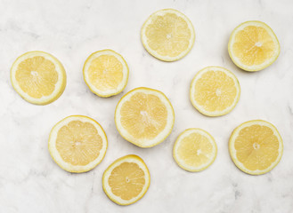 Top view slices of lemon of all sizes