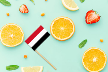 Yemen Paper Stick Flag. National summer fruits concept, local food market. Vegetarian theme.