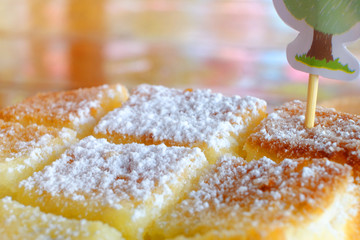 Closeup surface of toast with butter and sugar icing powder