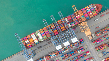 Container ship in export and import business logistics and transportation. Cargo and container box...
