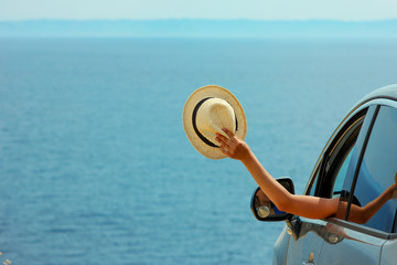 driver in car at sea