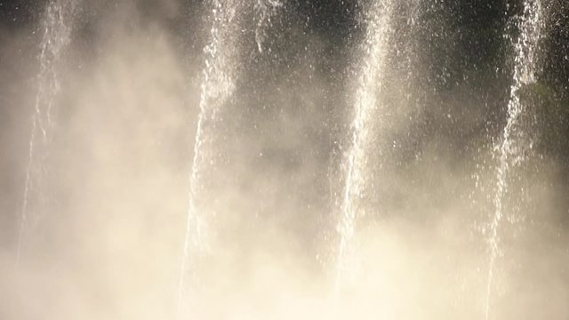 Detail slow motion of artesian fountain in the park