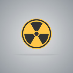 Round yellow-black radiation hazard icon isolated on gray background. Vector illustration.