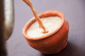 Tea served in a traditional clay cup