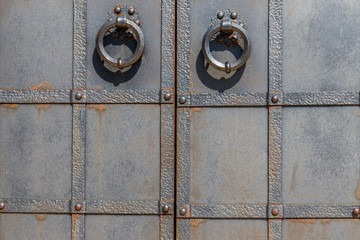 Close-up of the old iron black door