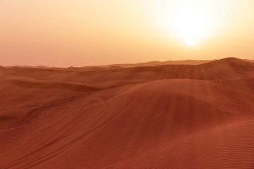 Sand desert sunset landscape with sun rays