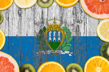 San Marino food concept. Fresh fruits from traditional gardens. Cooking concept on wooden flag...